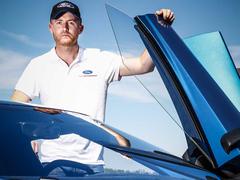 Racing driver with a racing car (for the road)